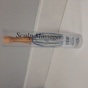 Free with purchase. Scalp massager.